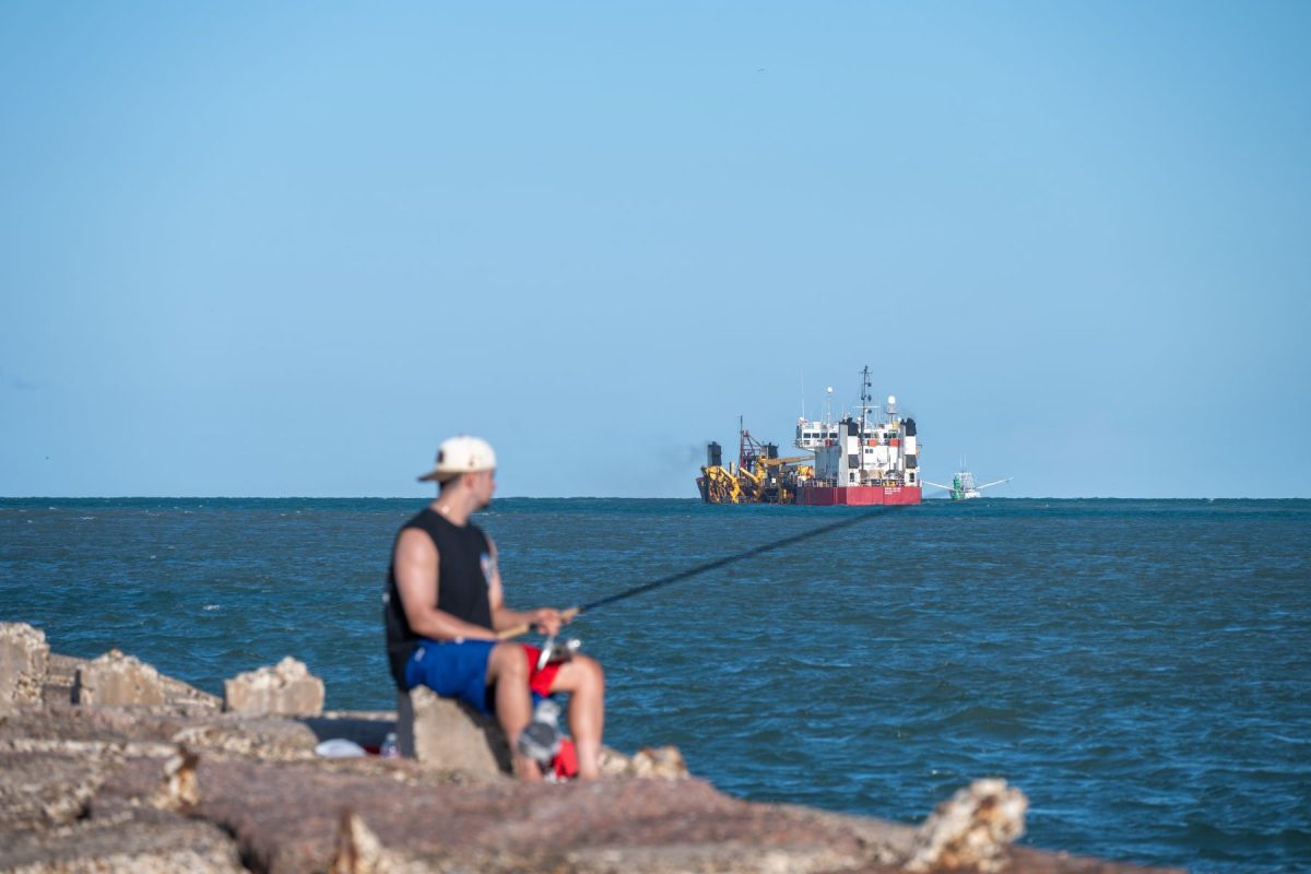 man fishing on south padre island